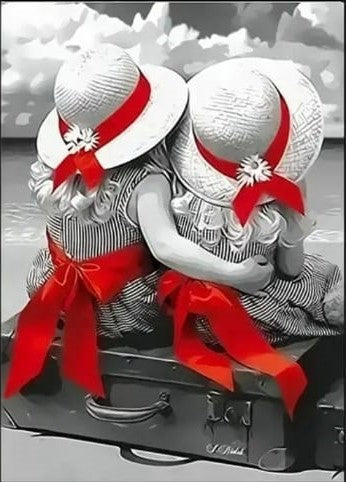 Little girls with red bows